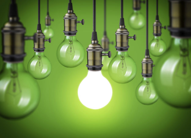 vintage light bulbs on green background